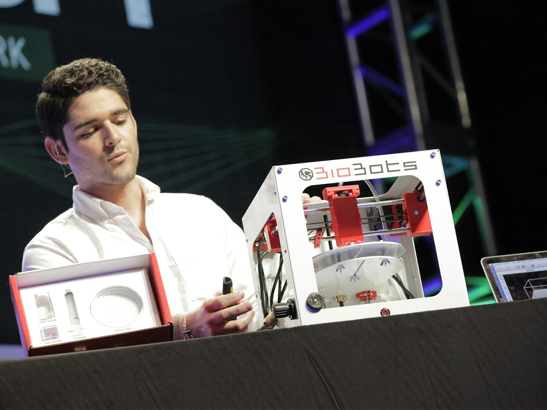 Danny Cabrera with a BioBot on stage