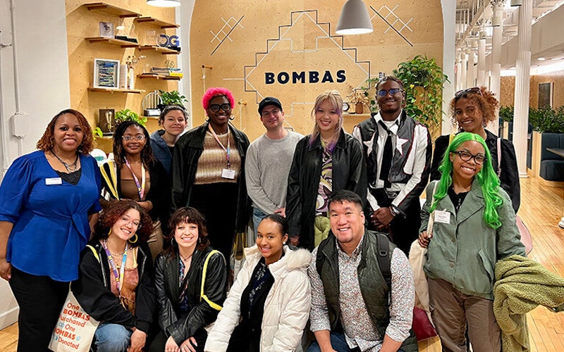 Students pose for a group portrait at Bombas